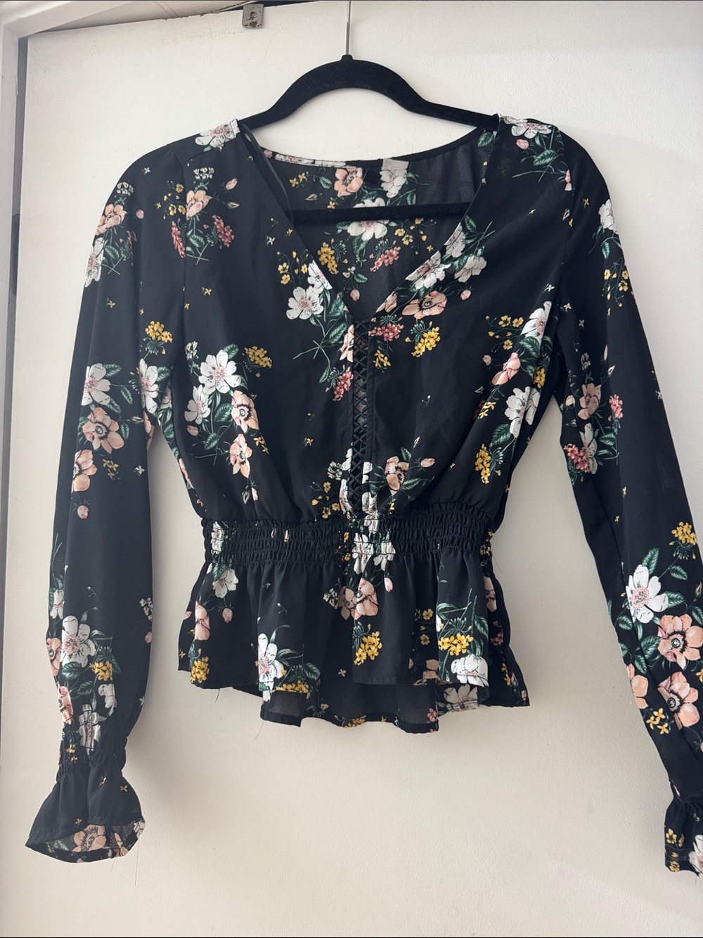 Divided Black Floral Smocked Peplum Long-Sleeve Top never worn!